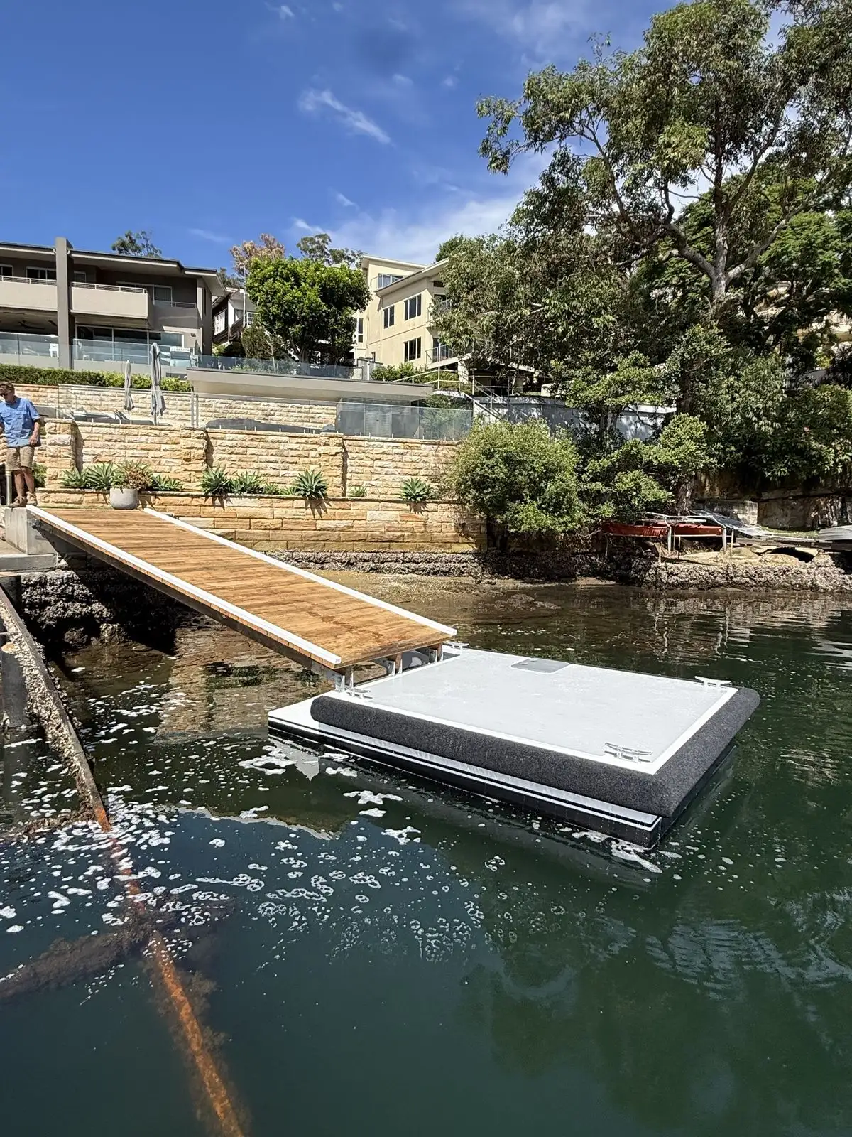 Jetty decking being replaced board by board