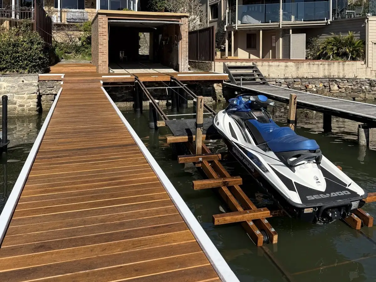 Jetty and timber cradle with a jet ski alongside